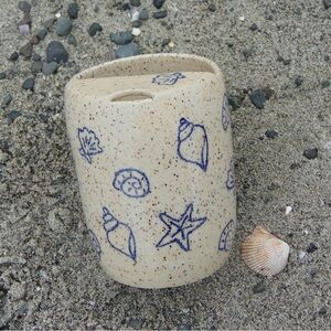Handmade ceramic sea shell sip cup